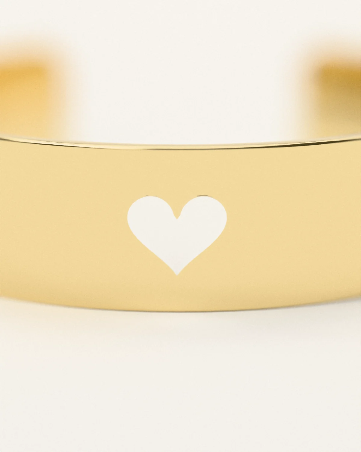 Brass heart cuff, close